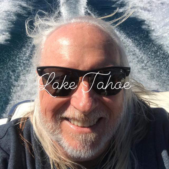 May be an image of 1 person, boat and text that says 'Lake Tahoe'